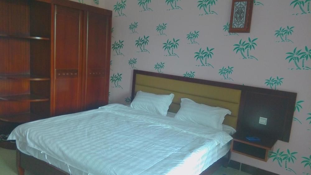 Ju Yuan Ge Hotel Санья Экстерьер фото