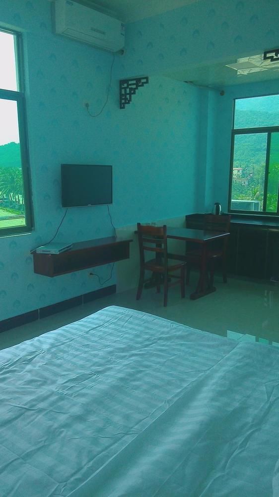 Ju Yuan Ge Hotel Санья Экстерьер фото