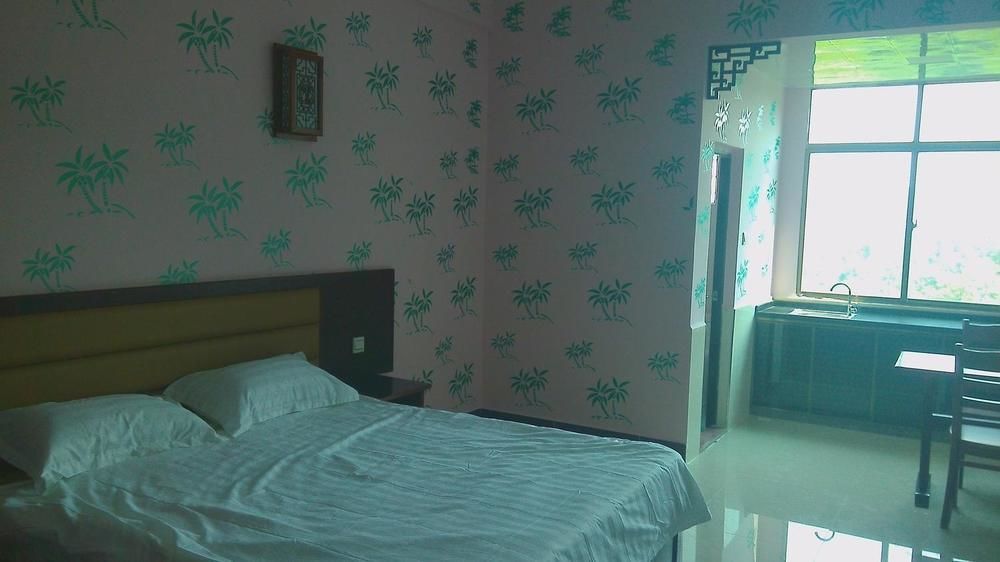 Ju Yuan Ge Hotel Санья Экстерьер фото