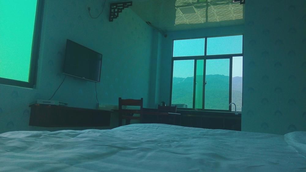 Ju Yuan Ge Hotel Санья Экстерьер фото