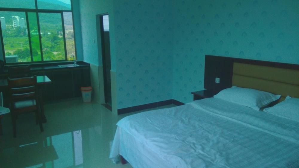 Ju Yuan Ge Hotel Санья Экстерьер фото