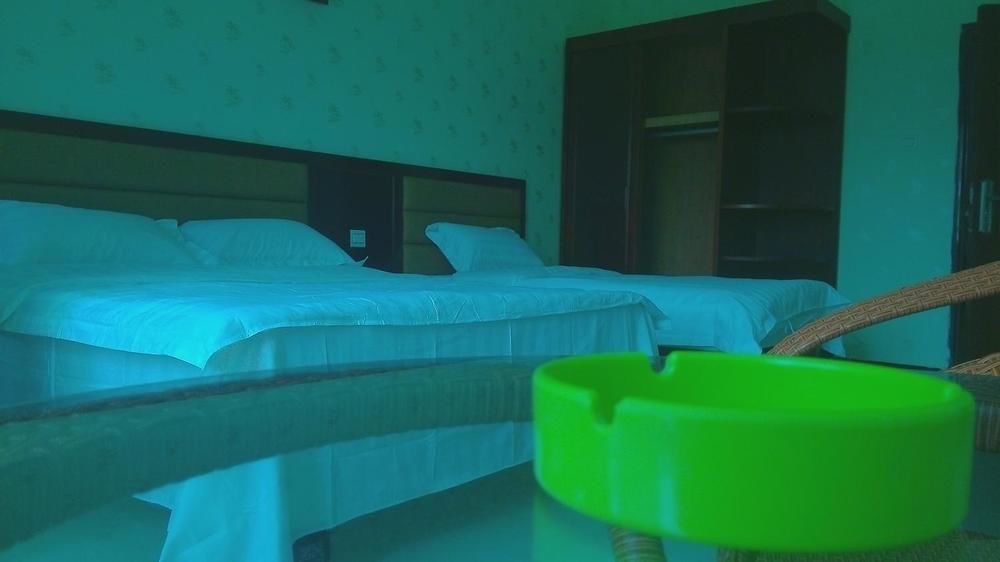 Ju Yuan Ge Hotel Санья Экстерьер фото