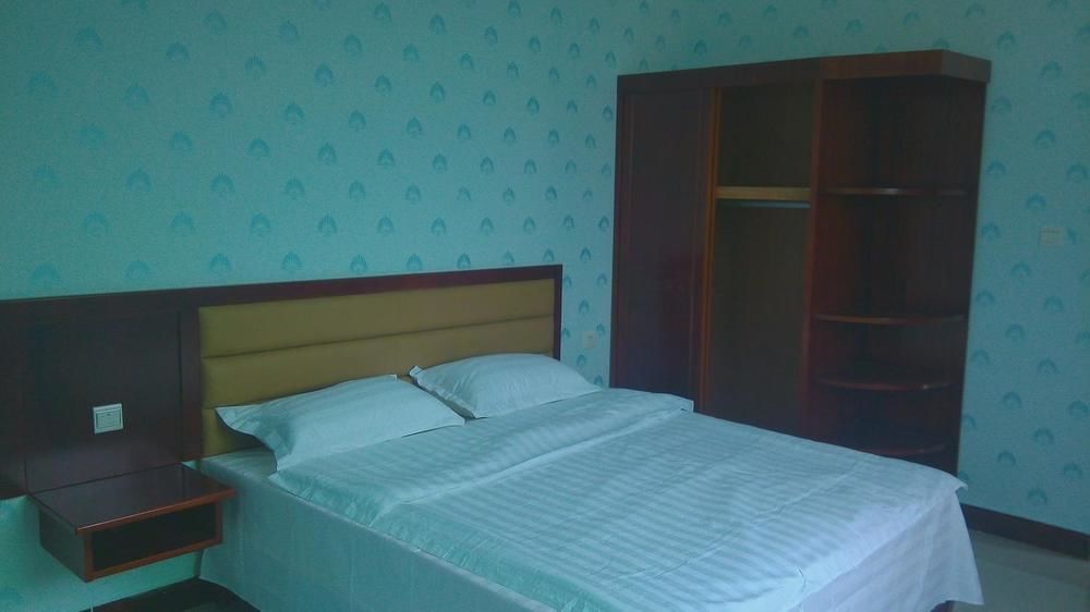 Ju Yuan Ge Hotel Санья Экстерьер фото