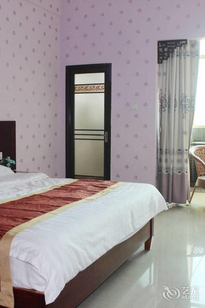 Ju Yuan Ge Hotel Санья Экстерьер фото