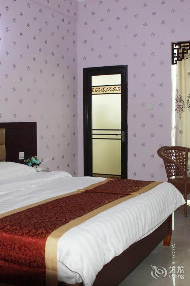 Ju Yuan Ge Hotel Санья Экстерьер фото