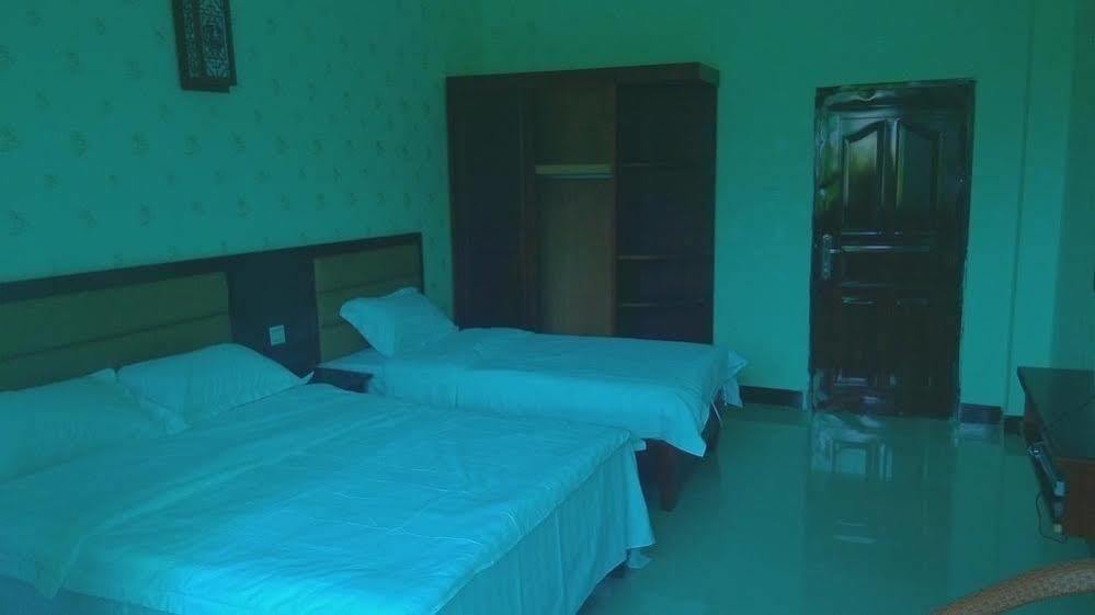 Ju Yuan Ge Hotel Санья Экстерьер фото